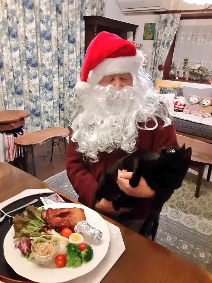 父親と猫の画像