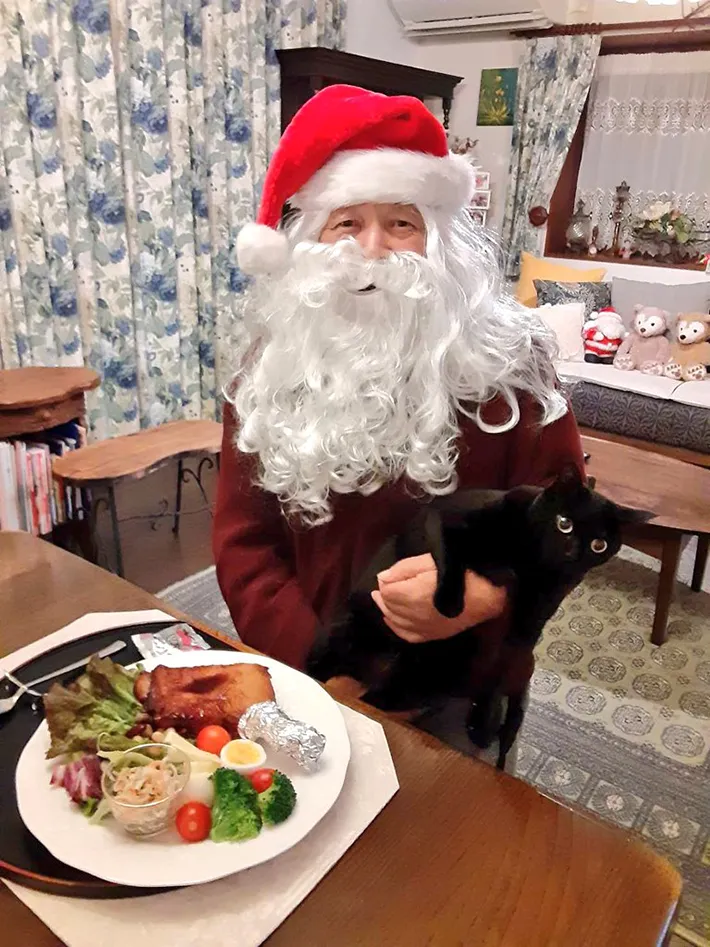 父親と猫の画像